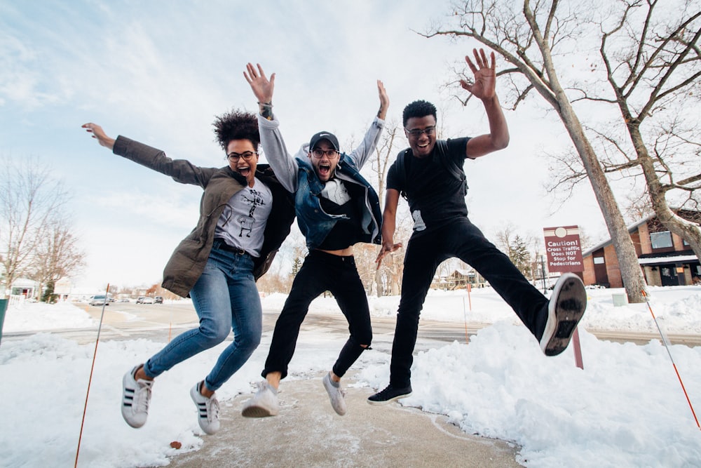 Young people smiling at a smartphone